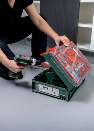 Metabo SB 18 L Set Perceuse-visseuse à percussion sans fil 18 V 50 Nm ( 602317710 ) + 2x batterie 2,0 Ah + chargeur + 78 pièces d'atelier mobile + coffret