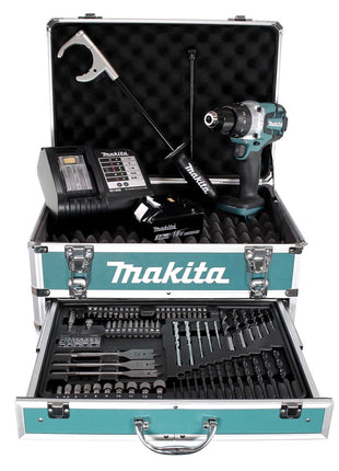 Perceuse à percussion sans fil Makita DHP 481 SFX4 18 V 115 Nm + 1x batterie 3,0 Ah + chargeur + 70 pièces. Coffret forets + coffret