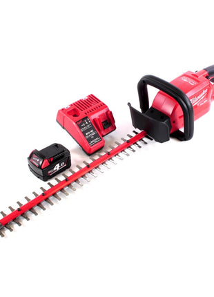 Taille-haie à batterie Milwaukee M18 CHT-401C 18 V 610 mm sans balai + 1x batterie 4,0 Ah + chargeur