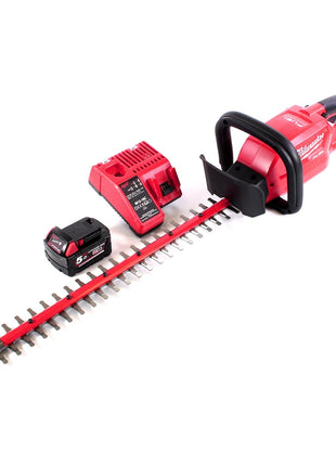 Taille-haie à batterie Milwaukee M18 CHT-501C 18 V 610 mm sans balai + 1x batterie 5,0 Ah + chargeur