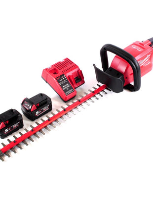 Taille-haie à batterie Milwaukee M18 CHT-502C 18 V 610 mm sans balais + 2x batteries 5,0 Ah + chargeur