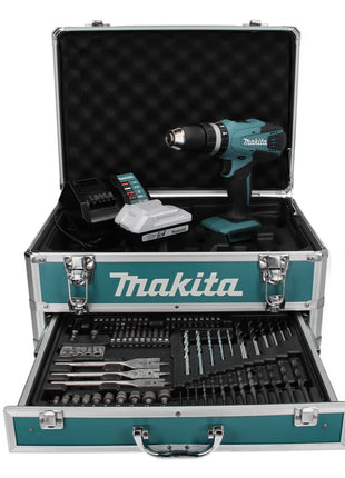 Taladro percutor inalámbrico Makita HP 457 DWX4 18 V 42 Nm Serie G + 1x batería 1,5 Ah + cargador + juego de brocas de 70 piezas + estuche