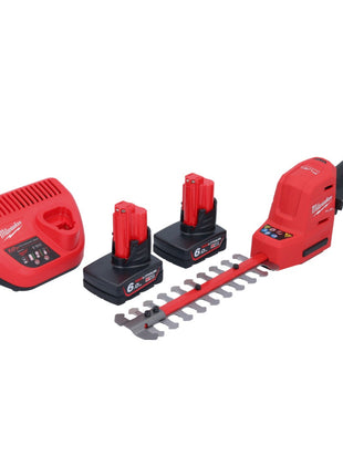 Cisaille à arbustes à batterie Milwaukee M12 FHT20-602 12 V 20 cm sans balais + 2x batteries 6,0 Ah + chargeur